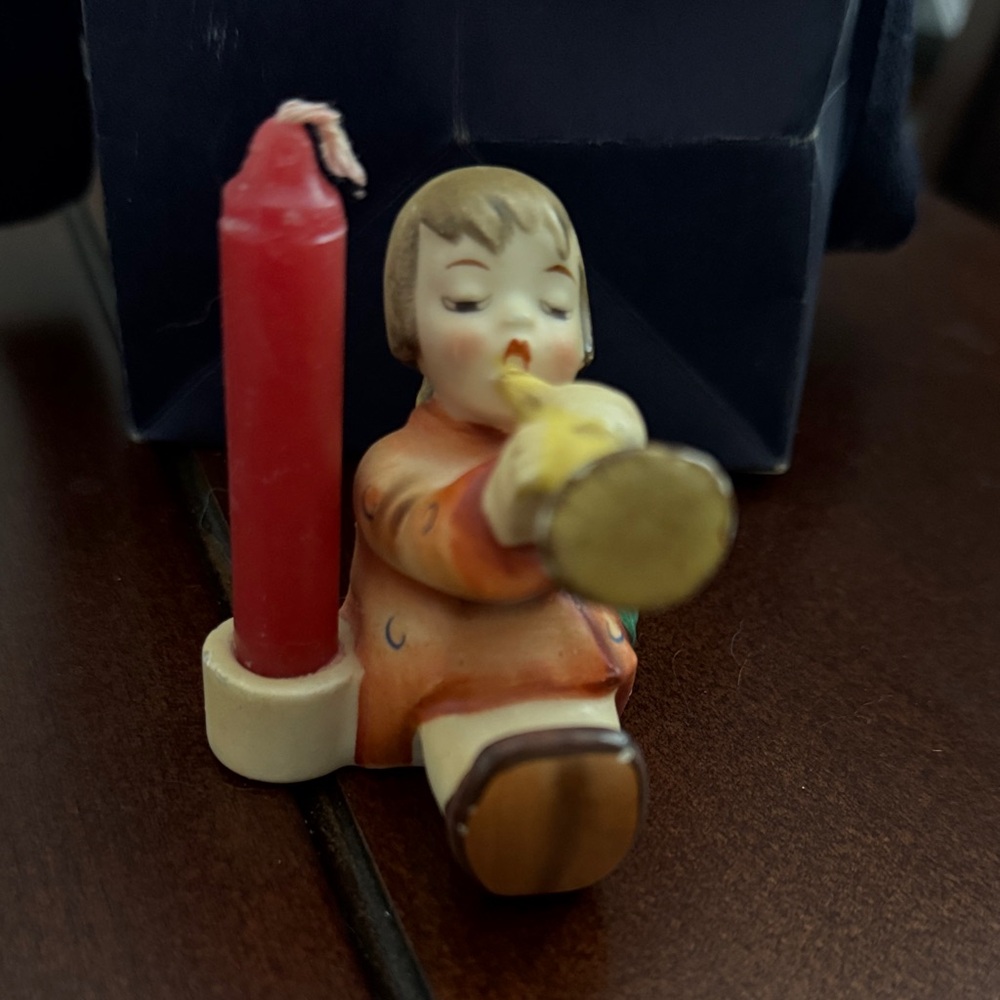 Hummel Figurine with Red Candle Holder